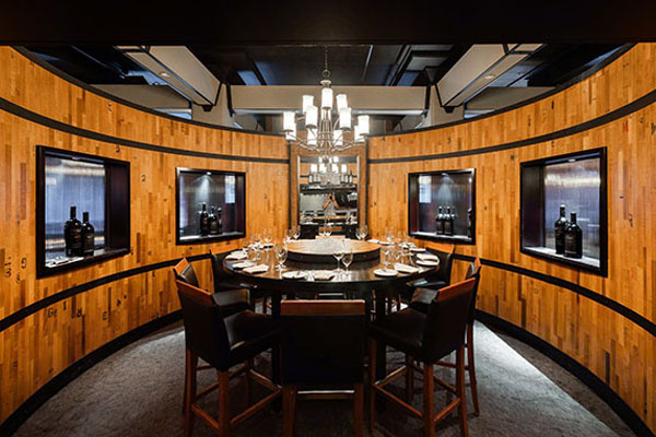 Vintage Chophouse Private Dining – Beringer Room Vintage Chophouse Beringer Room private dining table with wine displays
